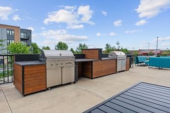 Two outdoor patios with kitchens and firepits